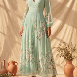 Cisella | Vestido midi em verde claro com padrão floral